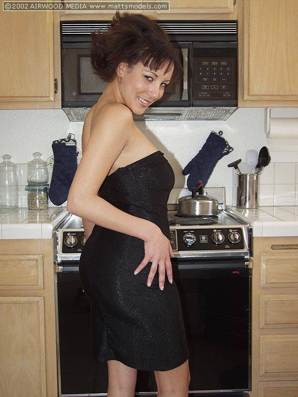 Amateur model Marissa holds her big naturals as she gets naked in the kitchen - #2