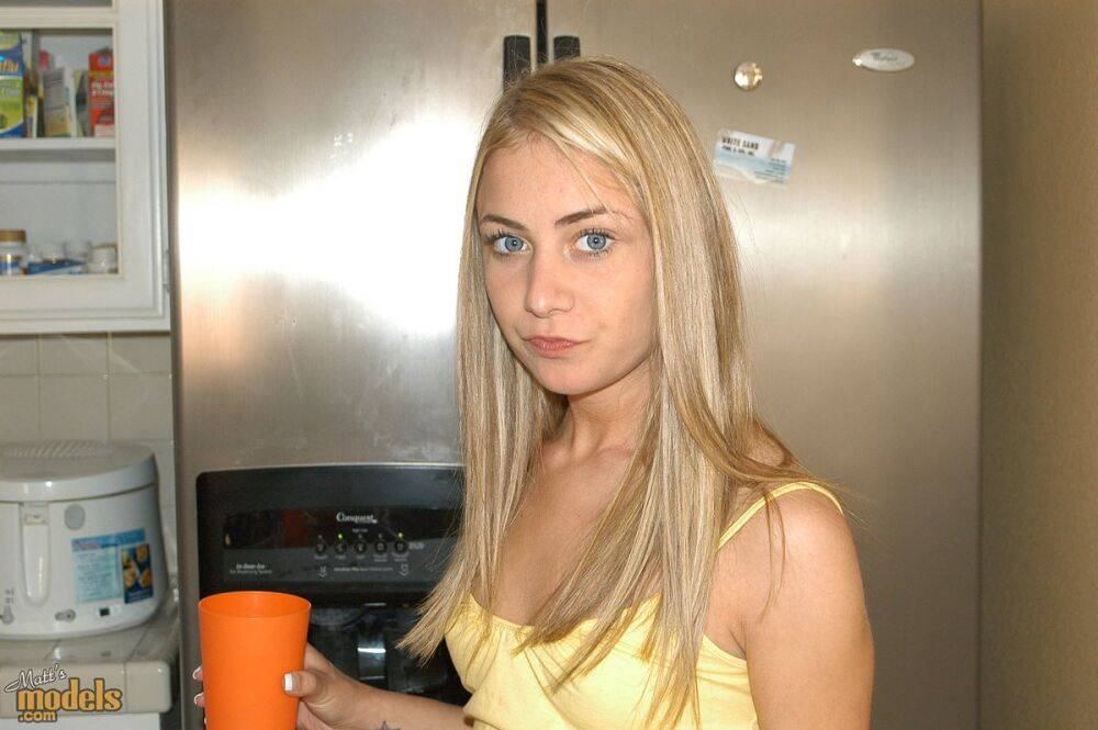 Blue eyed blonde Tyler Stevenz exposes her tiny tits during candid action - #1