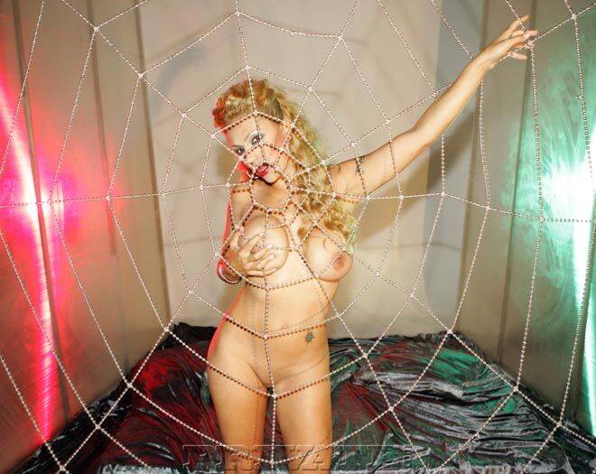 Hot solo girl with firm breasts models naked by a spider web - #12