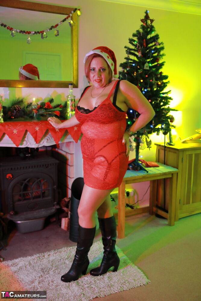 British BBW Curvy Claire models lingerie and boots in a Christmas cap - #14