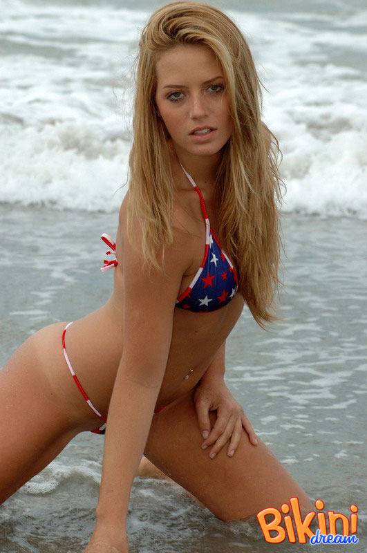 Blonde girl Shannon models in the surf wearing a bikini and a smile - #15