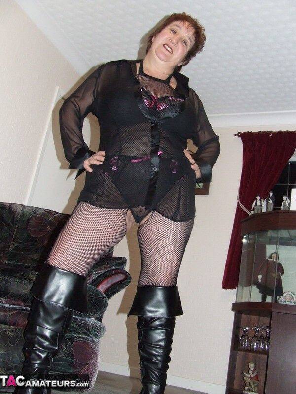 Mature BBW models by herself in crotchless pantyhose and leather boots - #10