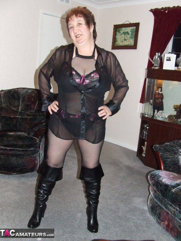 Mature BBW models by herself in crotchless pantyhose and leather boots - #9