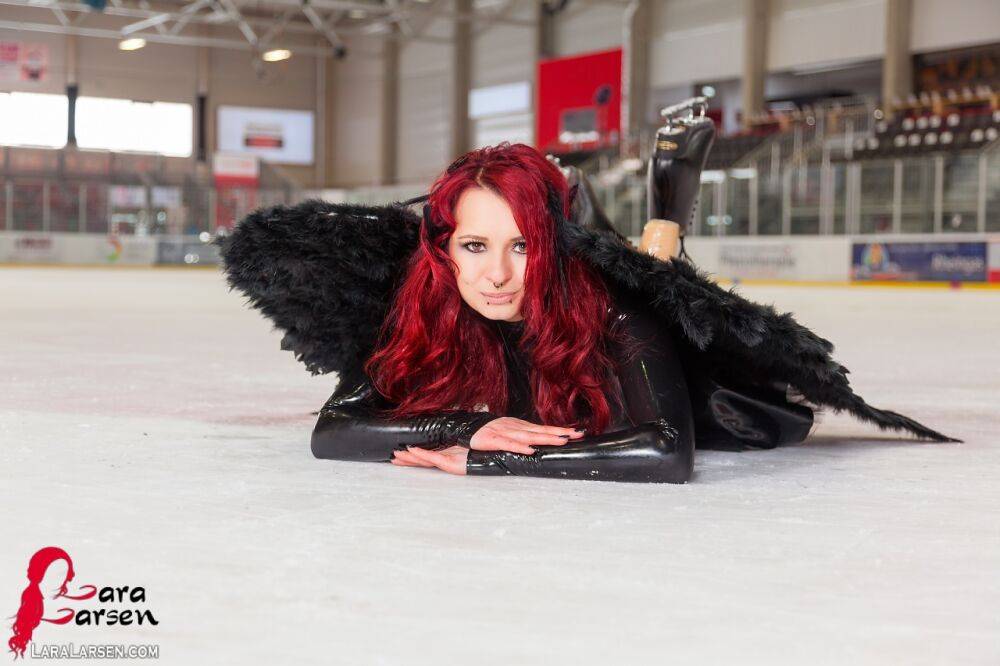 Redhead amateur Lara Larsen models non nude in latex attire with wings - #11