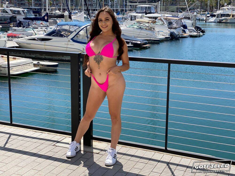 Curvy brunette Rose Lynn models a bikini at a marina before hardcore sex - #4