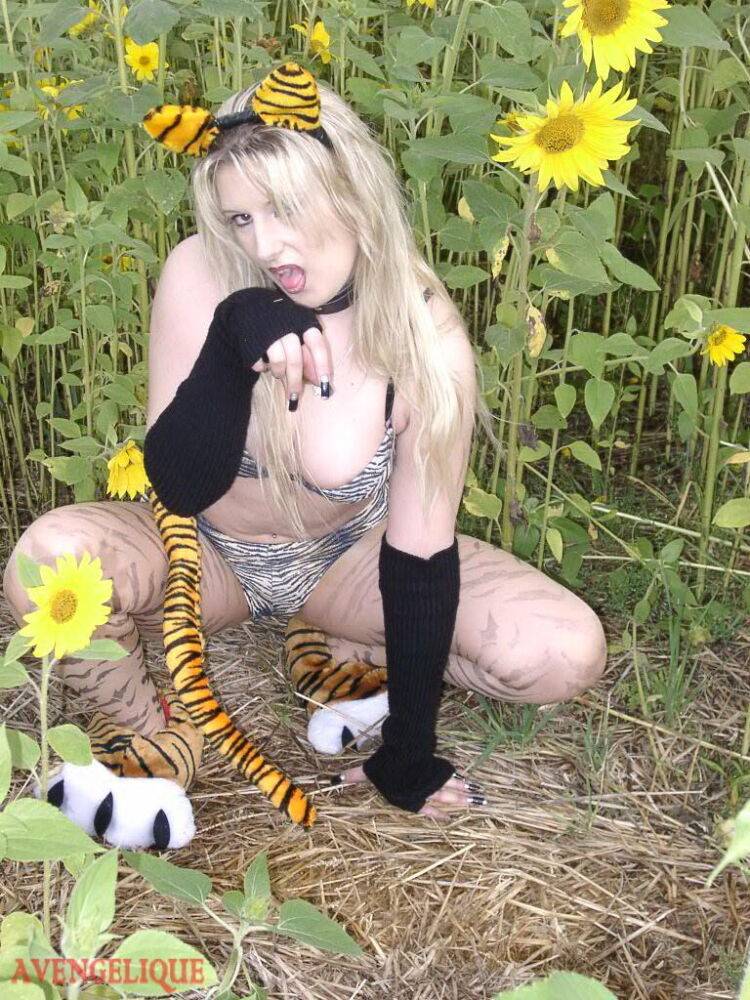 Blonde girl Avengelique models in her pretties and arm socks amid sunflowers - #13