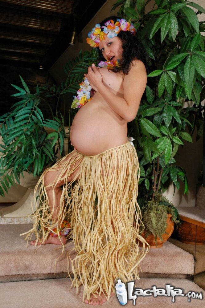 Pregnant Latina amateur Talia models naked in a grass skirt & Hawaiian garland - #10