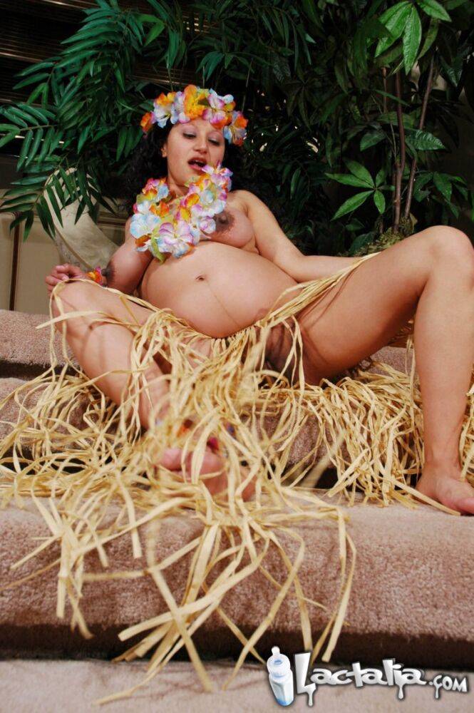 Pregnant Latina amateur Talia models naked in a grass skirt & Hawaiian garland - #14