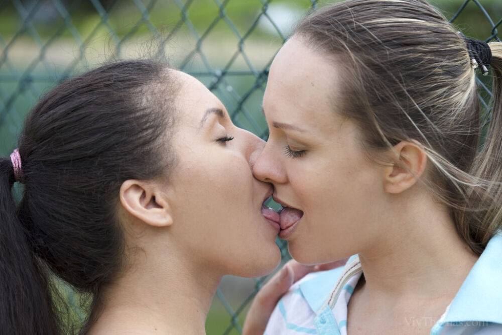 Lesbian teens Liv Revamped & Blue Angel have sex on a tennis court and indoors - #15