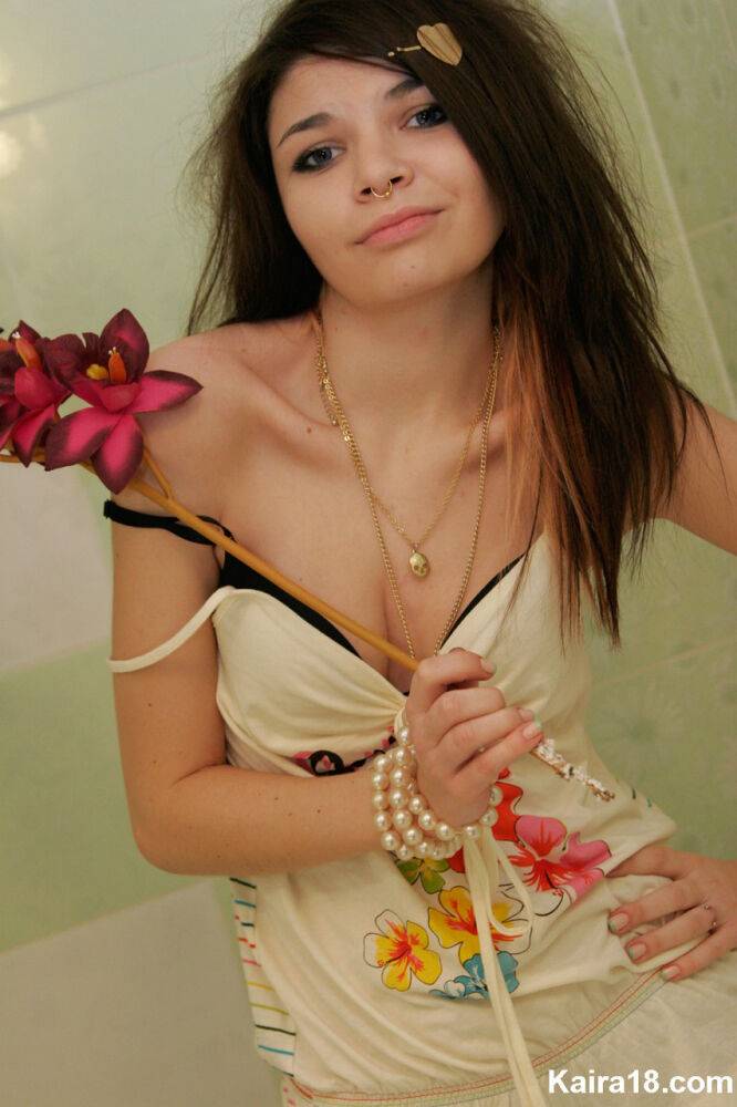 Tiny teen Kaira 18 scrunches up her face during a non nude shoot in a bathroom - #12