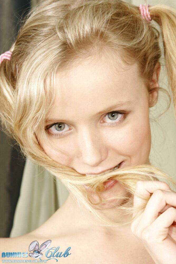 Young looking blonde Yana wears her hair in pigtails for her first nudes - #5