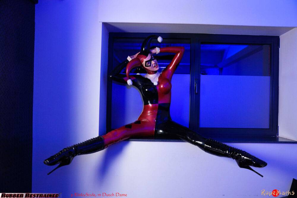 Solo model Dutch Dame poses in a Harley Quinn themed latex outfit - #16