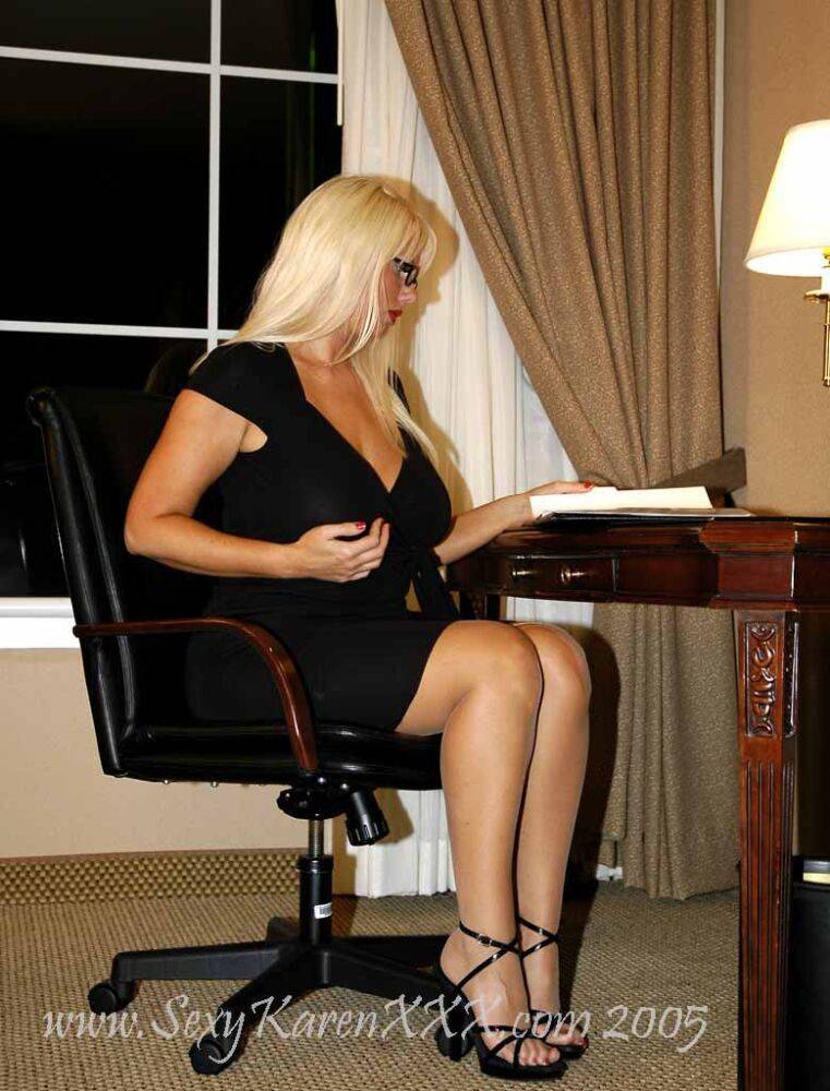 Blonde businesswoman Karen Fisher releases her firm tits from a black dress - #6