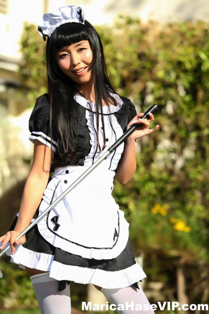 Japanese maid Marica Hase exposes her tits and twat on a putting green - #10