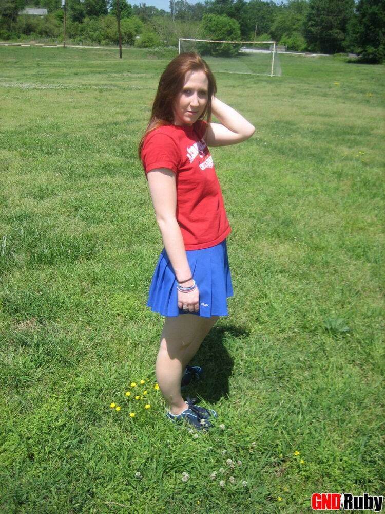 Teenage slut Ruby flashes her perky tits out in the park while picking flowers - #3
