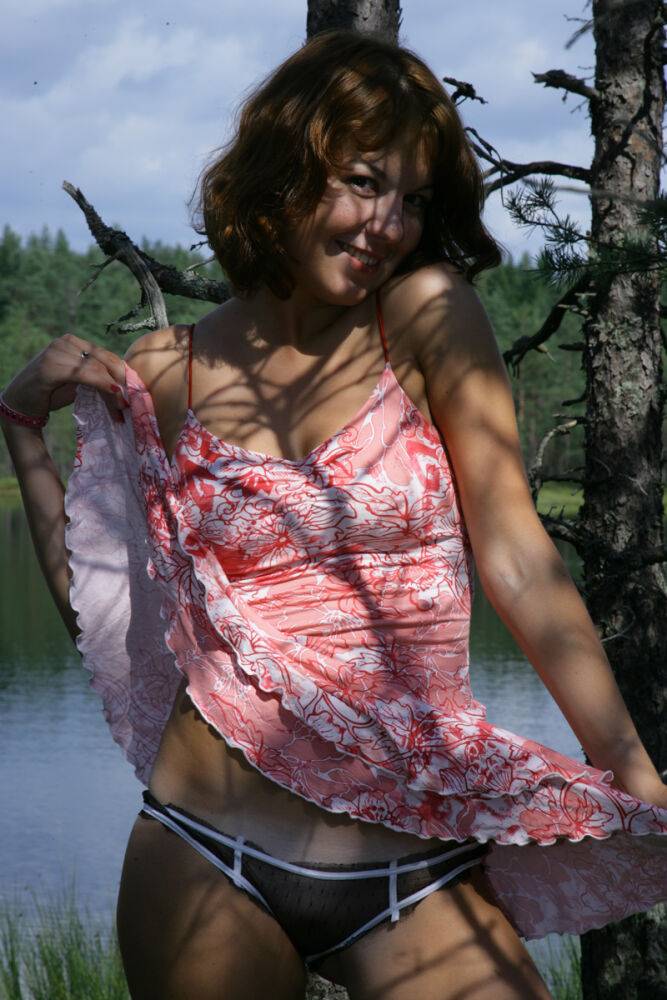 Charming teen Nasty gets completely naked down by a river - #3