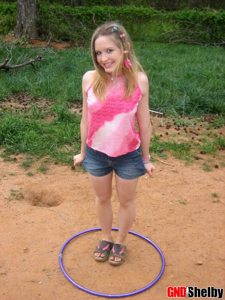 Petite teen Shelby plays around with a hoola hoop - #9