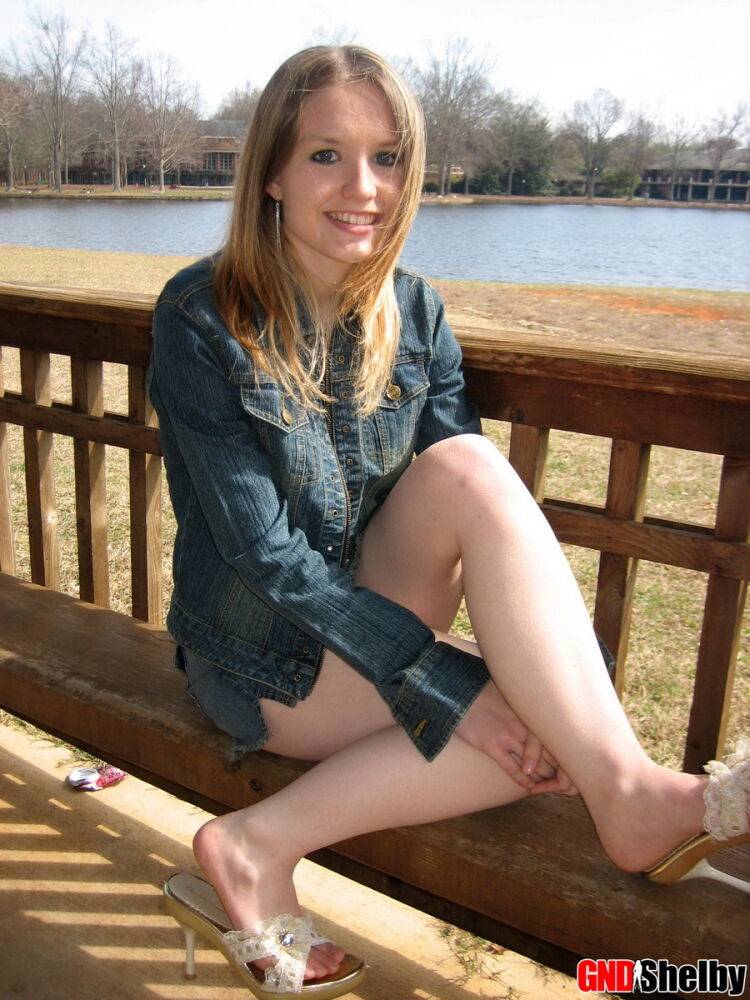 Cute slutty teen Shelby flashes her hard nipples at the lake in a public park - #10