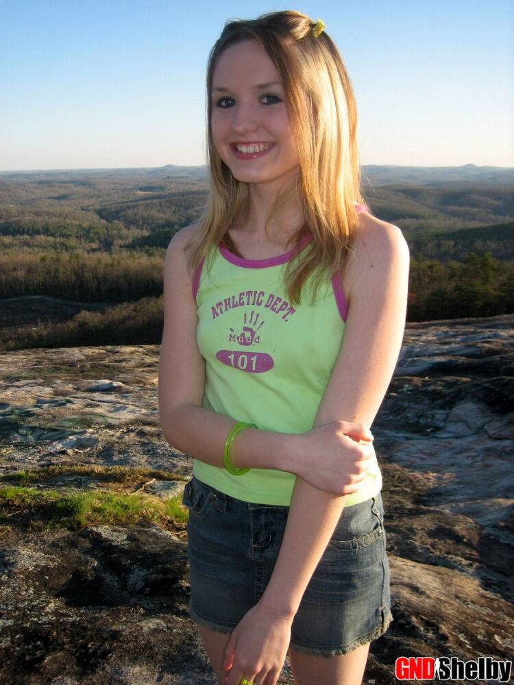 Perky teen Shelby flashes her perfect tits while on top of a mountain in a - #7