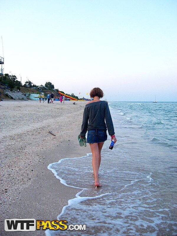 Amateur girl with red hair changes into a bikini before getting in the ocean - #7