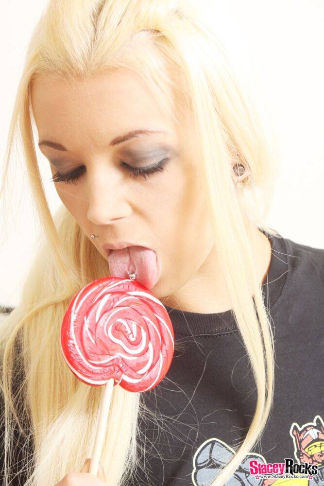 Blonde amateur Stacey Rocks licks a lollipop while getting naked in OTK socks - #11