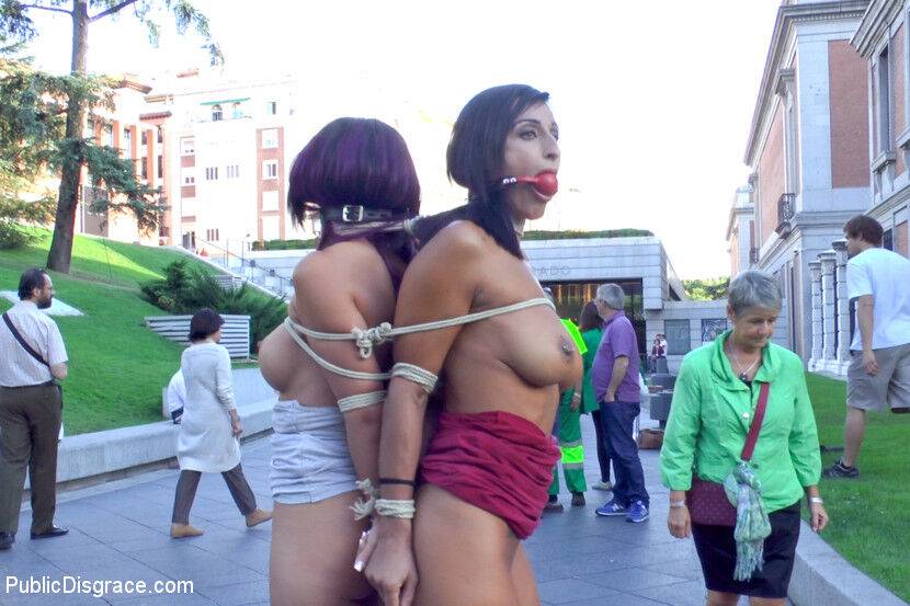 Beautiful girls are tied together during a public humiliation session - #1