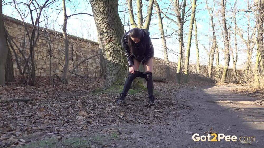 Naomi Benet squats in the woodland to piss - #11