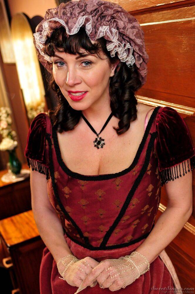 Hot mature brunette RayVeness shows sexy cleavage wearing medieval costume - #14