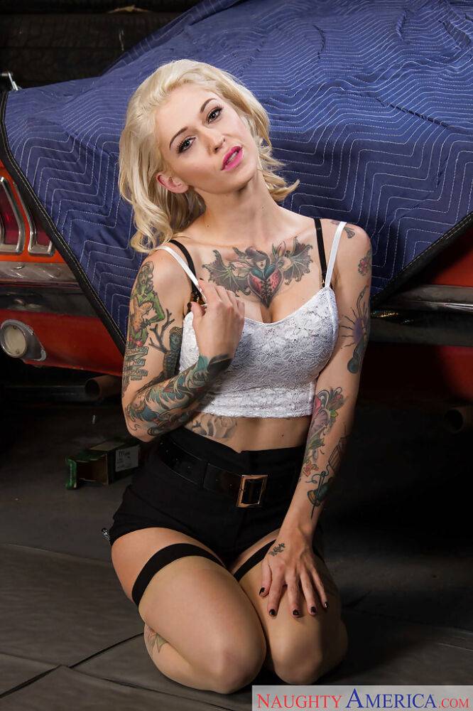 Tattooed blonde punk Kleio Valentien spreading pussy on top of muscle car - #2