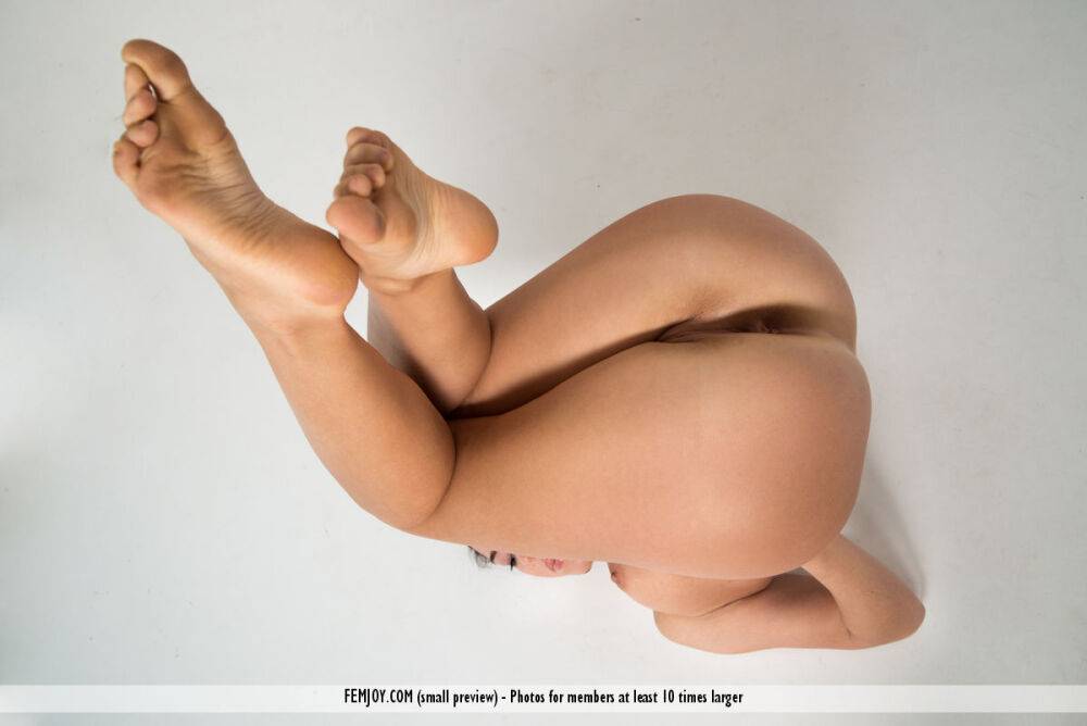 Totally naked girl Bree H demonstrates her flexibility during solo action - #1