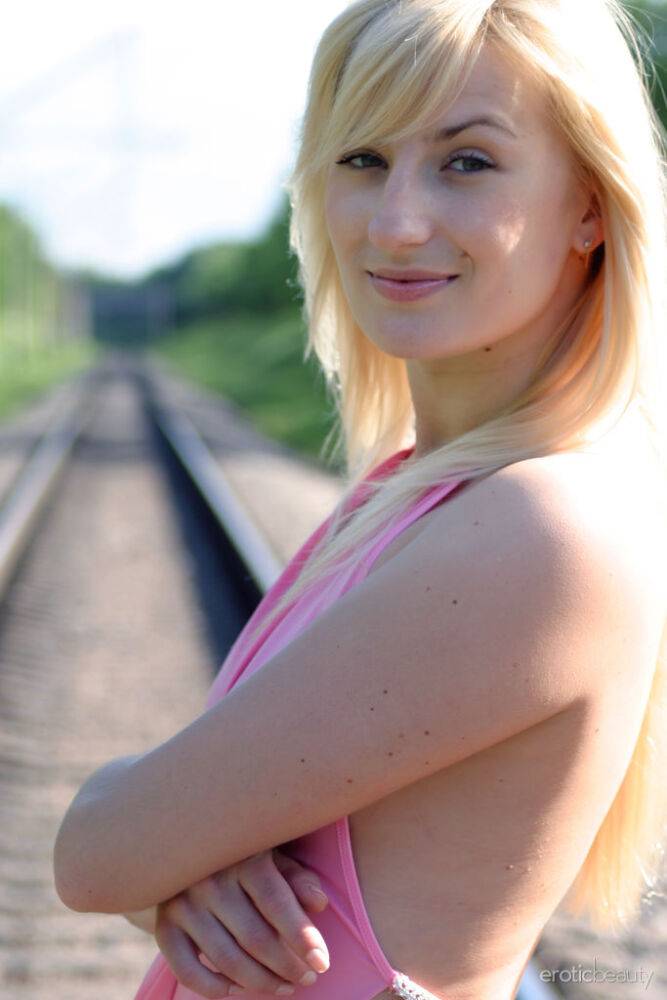 Margo proudly presents her sexiness at the train rail - #8