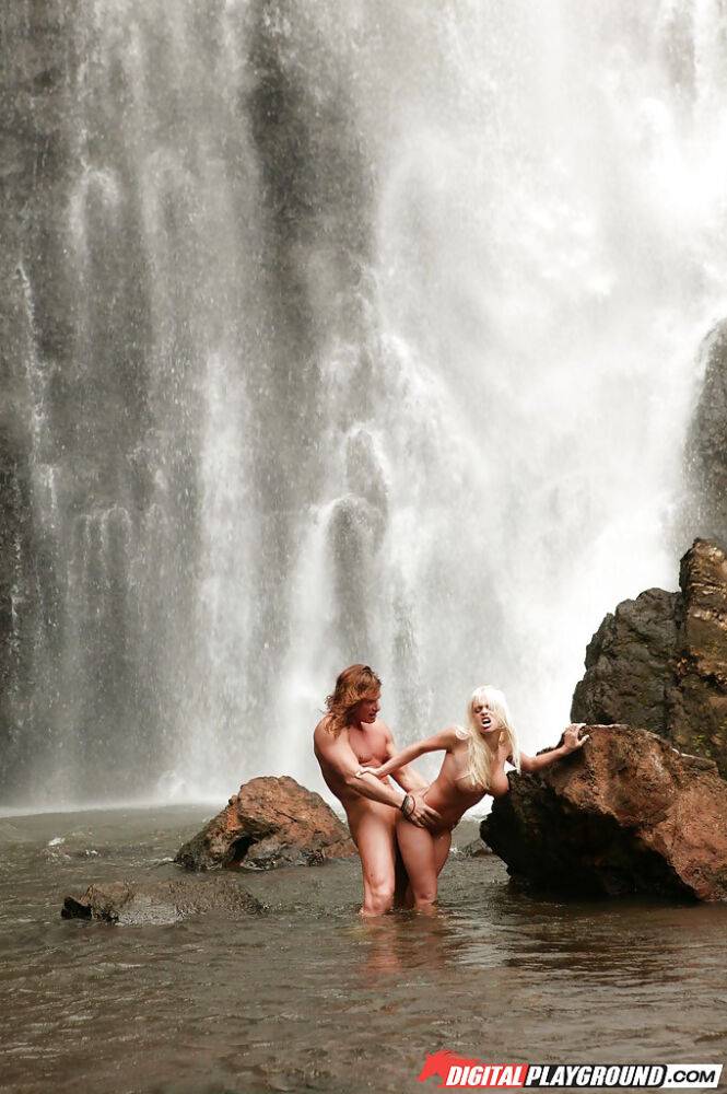 Stunning milf Jesse Jane fucks outdoor in the waterfall on cam - #3