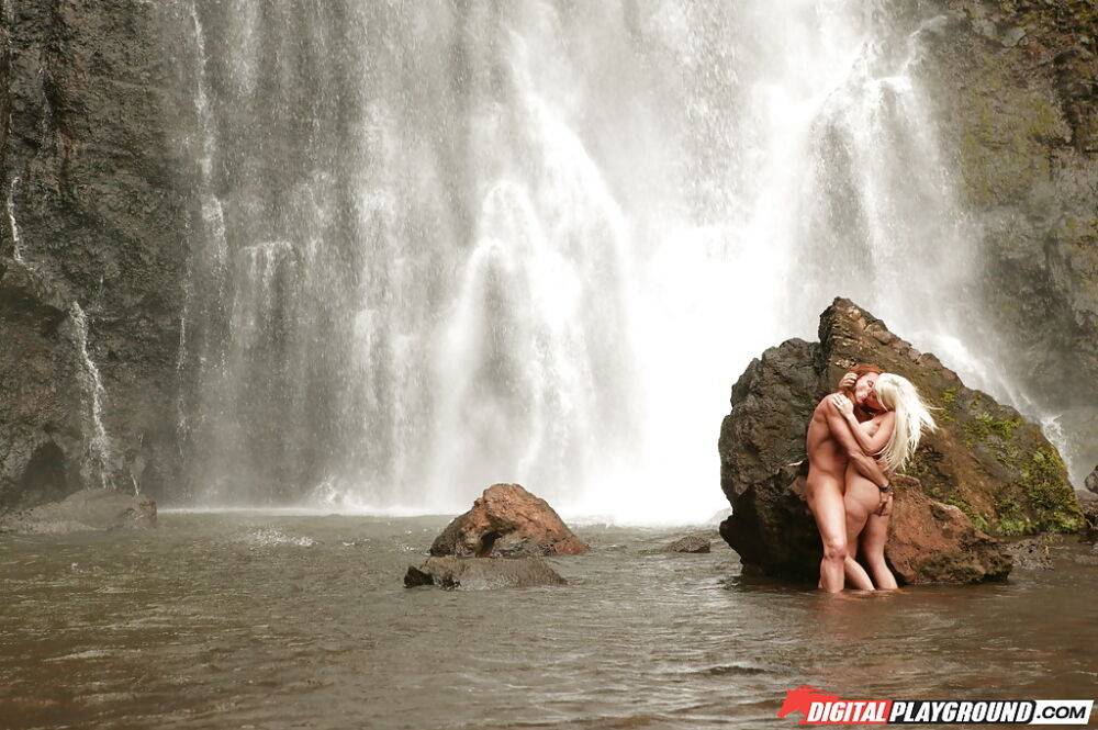 Stunning milf Jesse Jane fucks outdoor in the waterfall on cam - #2