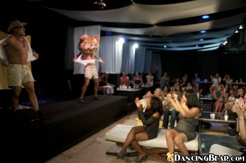 Splendid girls have fun with a dancing bear on a wild clothed party - #1