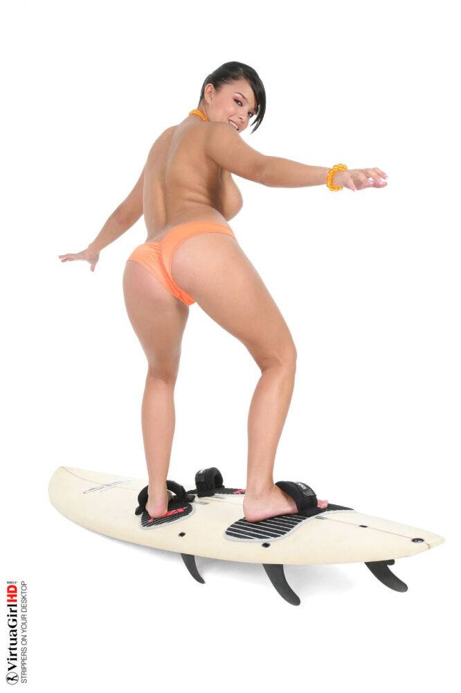 Sexy surfer girl Sarah peels off her bikini to model naked on her board - #9