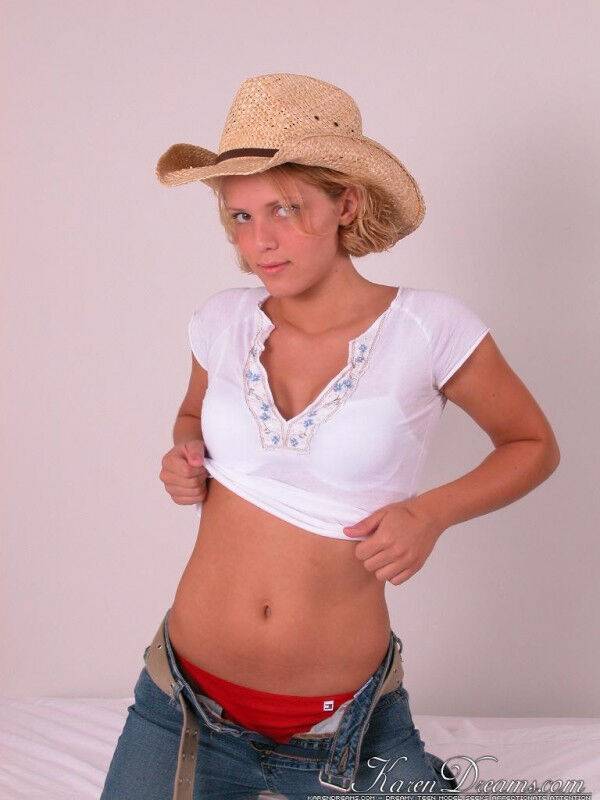 Teen first timer peels off jeans before covering her naked tits with straw hat - #4