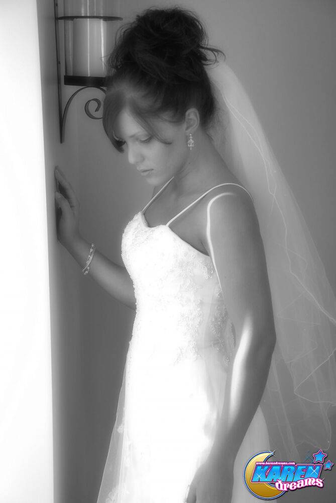 Young amateur wears her hair done up while modelling bridal wear - #3