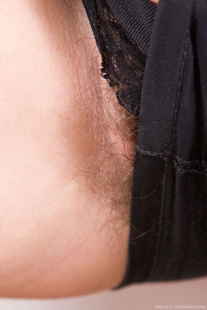 Young brunette teen Mary K reveals her very hairy pussy for an extreme closeup - #7