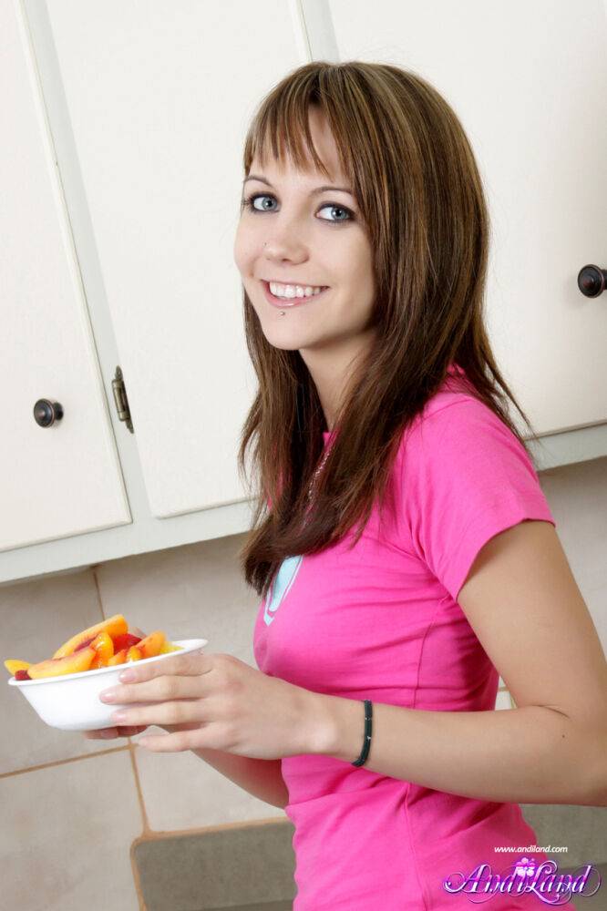 Petite teen Andi Land gets naked in her kitchen over a bowl of fruit - #15