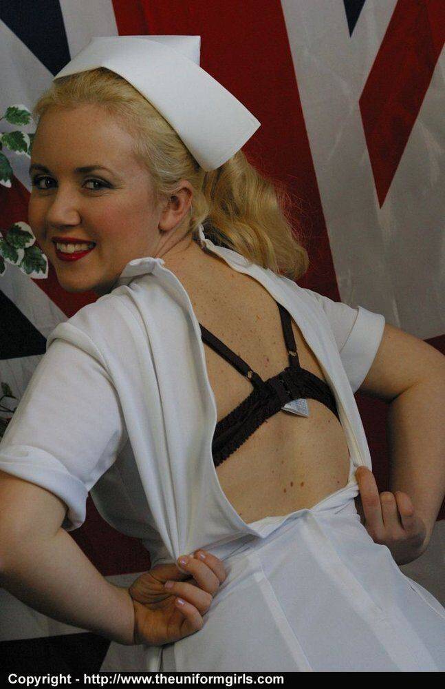 Chubby blonde nurse removes her uniform before baring tits and twat in nylons - #13