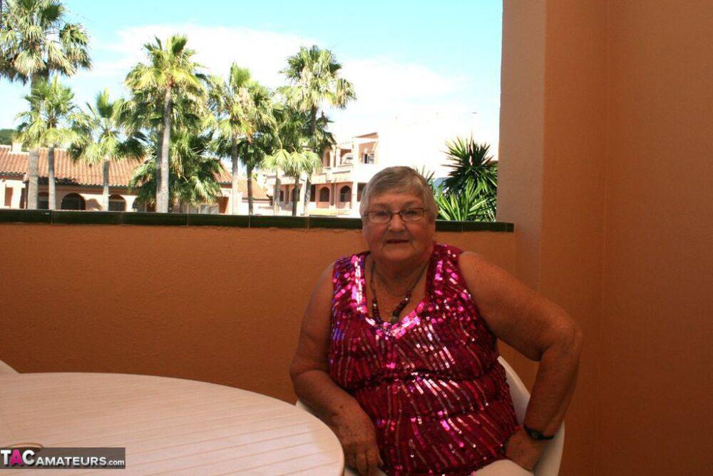 Obese grandmother GrandmaLibby parts her labia lips after disrobing on balcony - #4