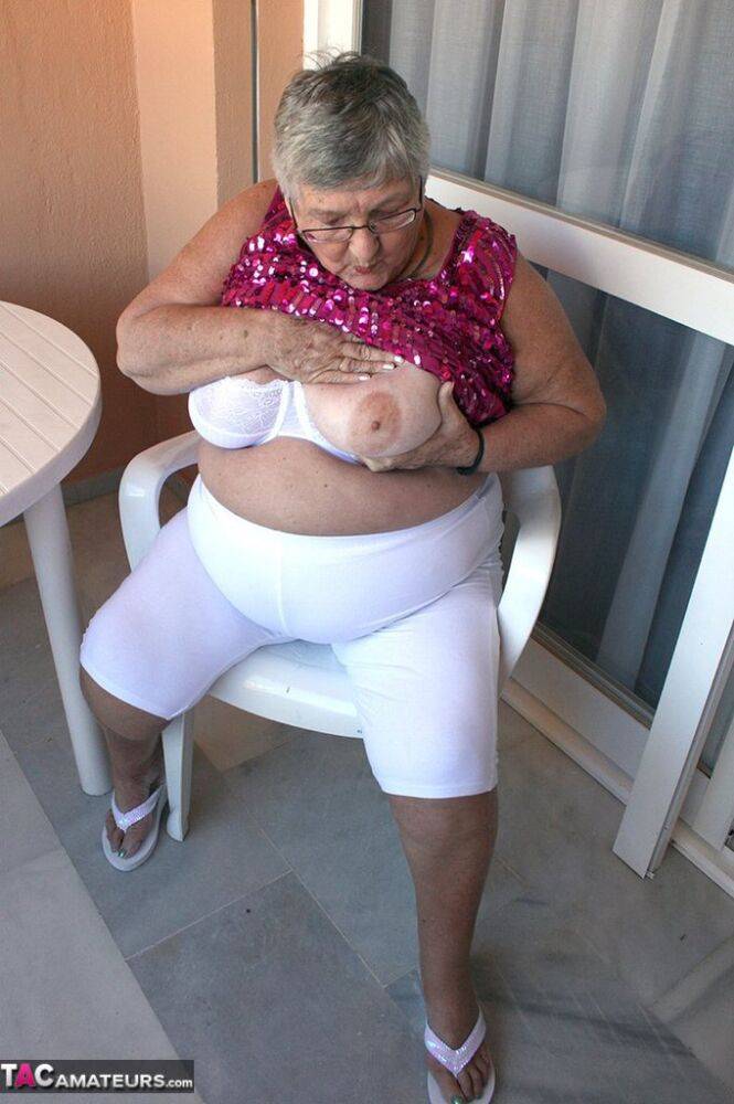 Obese grandmother GrandmaLibby parts her labia lips after disrobing on balcony - #15