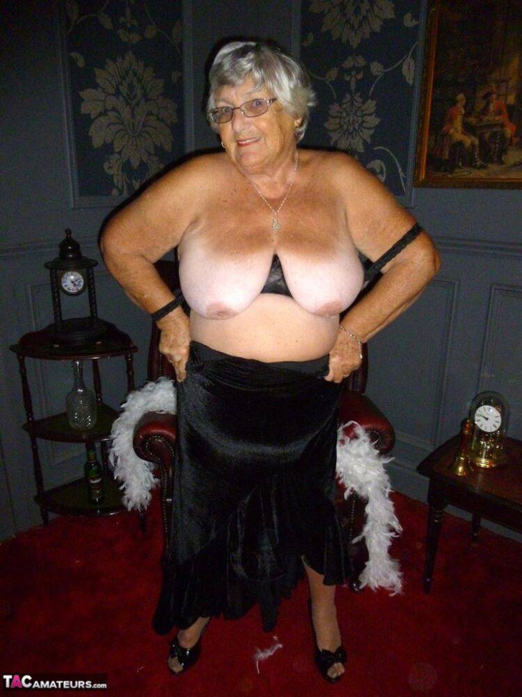 Fat nan Grandma Libby wears a feather boa while baring her saggy tits and butt - #8