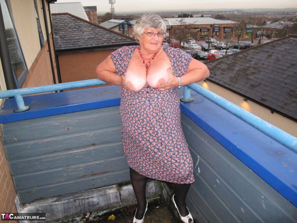 Fat UK nan Grandma Libby bares her tits on a balcony before getting butt naked - #16