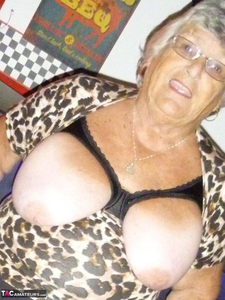 Fat nan Grandma Libby holds her big saggy tits in hand in nylons and garters - #10