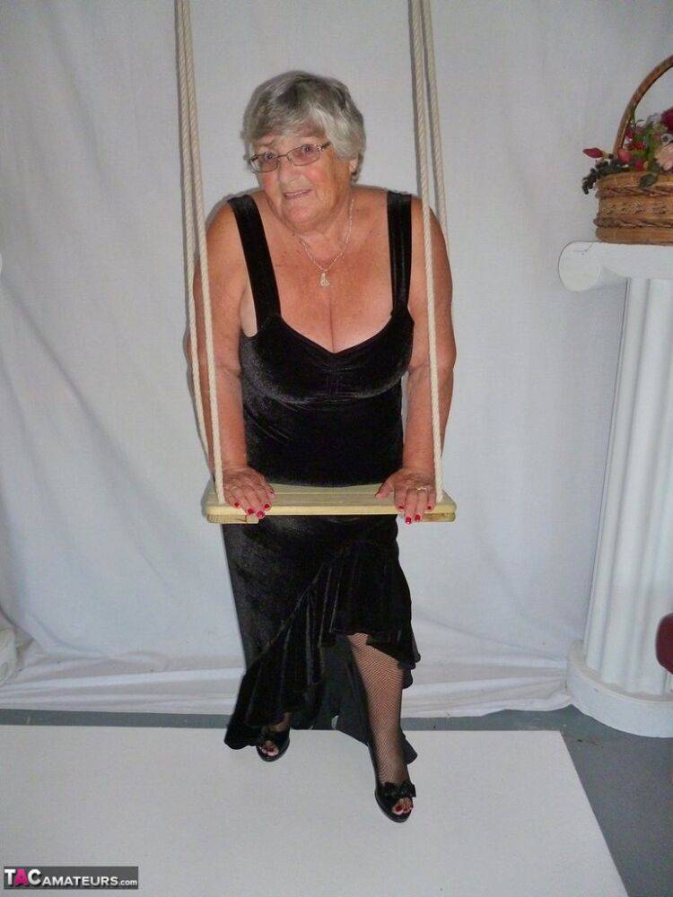 Fat nan Grandma Libby takes off a black dress to model naked in stockings - #1