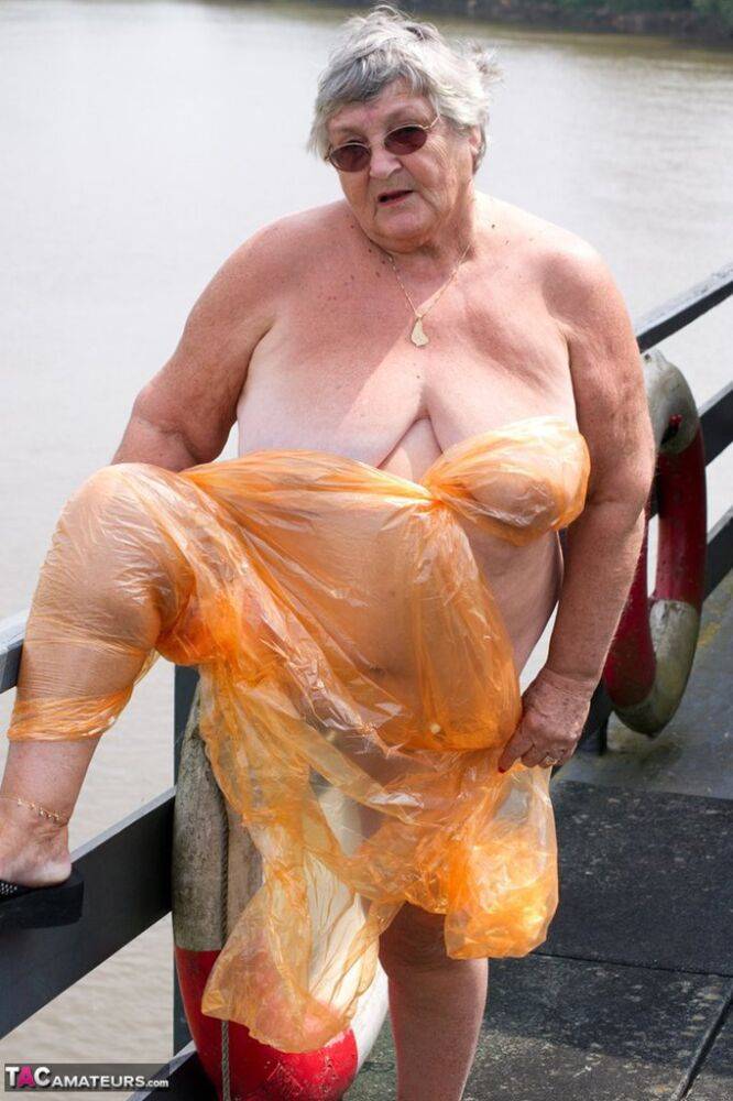 Obese oma Grandma Libby doffs a see-through raincoat to get naked on a bridge - #9