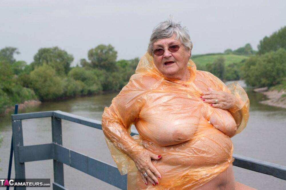 Obese British amateur Grandma Libby casts off a see-through raincoat - #6