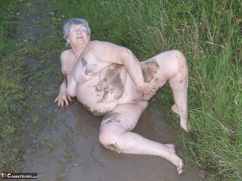 Fat nan Grandma Libby steps into a puddle before covering herself in mud - #8