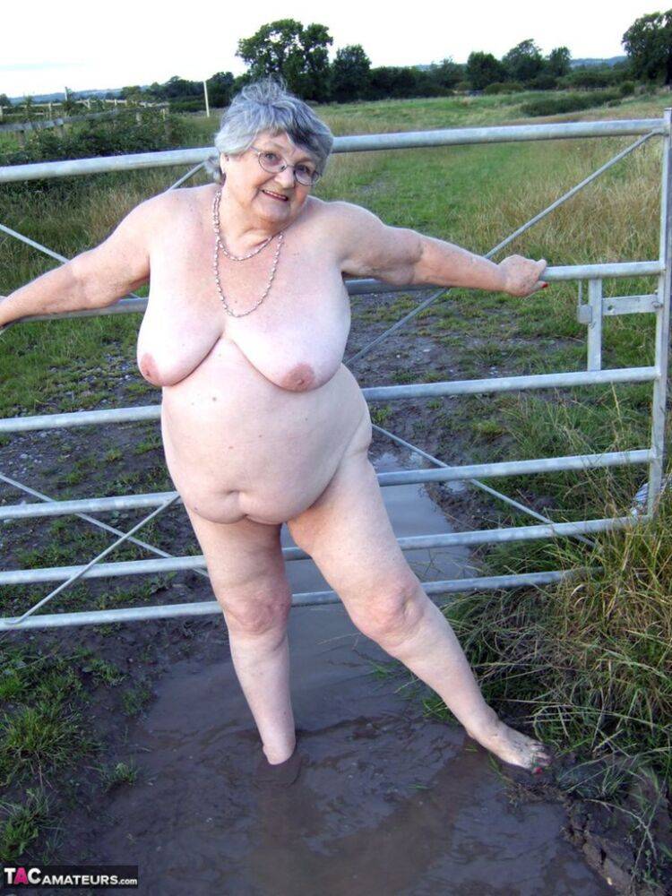 Fat nan Grandma Libby steps into a puddle before covering herself in mud - #2